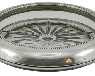 109 - Frank M. Whiting Co. Sterling Rim Bottle Coaster (Description): Frank M. Whiting Co. sterling silver and  glass bottle holder. Measures 1.5 inches tall  by 10 inches in diameter.