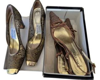 2842 - 2 Pr Designer Heels Timothy Hitsman J. Renee (Description): Two pairs of women's designer heels, size  8.5. The first pair by Timothy Hitsman  features a gold and black leopard print  pattern with gold metallic block heels. The  second pair by J. Renee showcases a strappy brown woven design with delicate ankle ties.  Both pairs are used & in coordinating gold  and bronze tones.
