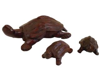 366 - Carved Rosewood Turtles w/ Glass Eyes (Description): A collection of carved rosewood turtles  featuring glass eyes. The set includes  multiple turtle figurines in varying sizes,  each hand-carved from rosewood with detailed  shell patterns and inset glass eyes.