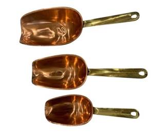 660 - 3 Copper Scoops w/ Brass Handles (Description): Each scoop features a hanging hole at the end  of the handle for convenient storage.