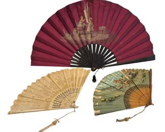 1440 - Three Vtg Hand Painted Wood Handle Fans (Description): Collection of three vintage wood handle  folding fans, each measuring 14 inches. The  group includes a large burgundy silk fan with  a hand-painted figural scene and black  lacquered sticks, a cream-colored lace fan with delicate carved bone or celluloid  sticks, and a painted paper fan with  landscape decoration on natural wood sticks.  Each fan features ribbon or tassel accents.  Largest 14" long