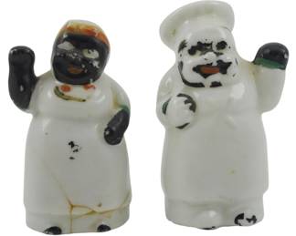 1708 - Pr Vtg Black Americana Shakers 2.5" (Description): Pair of vintage Black Americana salt and  pepper shakers. The figural ceramic shakers  depict a cook and chef in white attire. Each  measures 2.5 inches tall.