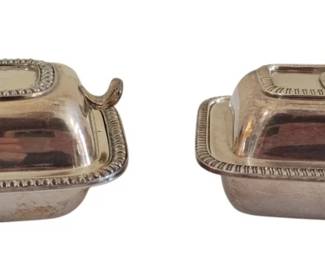 425 - Pr Vtg Silver Plated Miniature Covered Dishes (Description): Pair of vintage silver plated miniature  covered dishes featuring decorative gadroon  borders on the lids and bases. Each dish  includes a fitted lid with handle. One dish  has a ring-style handle while the other features integral side handles. Measures  approximately 2 x 5 x 3.5 inches.