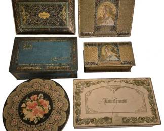 3922 - 6 Early Decorative Lithographed Tin Boxes (Description): Collection of six early tin boxes featuring  ornate lithographed designs. The assortment  includes boxes with Art Nouveau-style female  portraits, intricate gilded scrollwork  patterns, a floral motif piece with roses, and various decorative borders. One box is  marked 'Loveliness' and others display period  typography. The collection showcases  Victorian and early 20th century decorative  tin craftsmanship with rich colors and