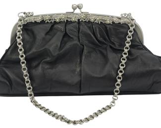 1834 - Vtg Adrienne Vittadini Leather Evening Purse (Description): Vintage Adrienne Vittadini leather evening  purse featuring a decorative metal frame with  chain strap. Measures 5 inches high by 10  inches wide by 3 inches deep.