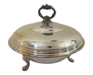 378 - Sheridan Tri Footed Covered Serving Dish (Description): Sheridan silver plated covered serving dish  featuring a tri-footed base. The piece  includes a domed lid with decorative handle.  Measures 10 inches by 6 inches.