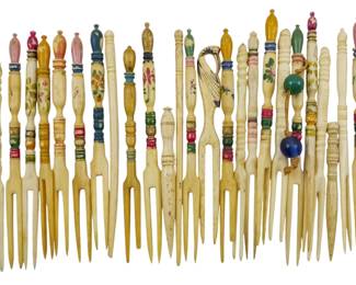 43 - Assorted painted & Adorned Bone Cocktail Forks