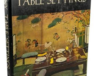 773 - 1960 First Ed. Tiffany Table Settings (Description): Tiffany Table Settings, first edition,  published in 1960. This hardcover book  features elegant table setting designs and  entertaining inspiration from the renowned  Tiffany & Co.