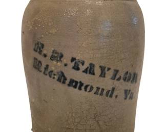 2726 - E.B. Taylor Richmond Va Stoneware Crock 10" (Description): E.B. Taylor stoneware crock from Richmond,  Virginia. This antique salt-glazed crock  features cobalt blue stenciled lettering  reading "E.B. Taylor Richmond, Va." on the  front. The piece displays characteristic gray stoneware coloring with a rounded rim and  traditional cylindrical form. Shows expected  age-related crazing and surface wear  consistent with 19th century use. Measures 10  inches in height.