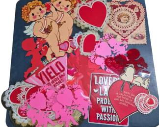 4146 - Vintage Valentines Day Decor (Description): A collection of vintage Valentine's Day decor  items featuring an assortment of decorative  pieces in classic Valentine motifs including  hearts, cupids, and lace designs.