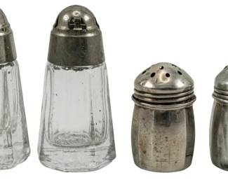 734 - 4 Assorted Makers Sterling Silver Shakers (Description): Four assorted makers sterling silver shakers  (assumed to be sterling). The largest  measures 2 inches tall.