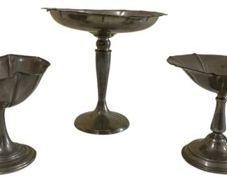 1684 - Collection of 3 Compotes (Description): Assorted styles, each featuring a footed  pedestal base. The compotes measure 7.5  inches by 7.5 inches.