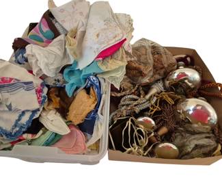 4007 - Group Lot of Hankies & Curtain Tie Backs (Description): Group lot of assorted hankies and curtain tie  backs. The collection includes a variety of  vintage handkerchiefs in multiple colors and  patterns, including embroidered,  lace-trimmed, and printed designs. Also included are decorative curtain tie backs  featuring tassels, beaded trim, and  silver-toned spherical ornaments with braided  cords. A diverse assortment of textile  accessories and home decor items.