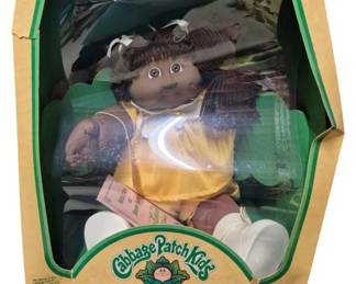 4154 - Cabbage Patch Kids Francine Kathleen Doll (Description): Cabbage Patch Kids doll named Francine  Kathleen. The doll is presented in its  original packaging featuring the classic  Cabbage Patch Kids branding with the tagline  "I'm one of a kind. I'm Adoptable." Includes adoption papers.