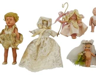 121 - Assorted Vintage Dolls (Description): A collection of assorted vintage dolls in  various styles and sizes. The lot includes  dolls in period dress, some with movable  limbs, and includes a bride and groom pair.  The dolls display a variety of construction materials and clothing styles typica