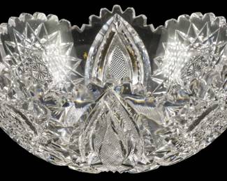 138 - American Brilliant Cut Glass Bowl 3"x8" (Description): American Brilliant cut glass bowl featuring  intricate cut patterns. Measures 3 inches  tall by 8 inches in diameter.
