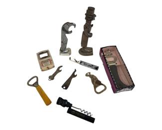 560 - Lot of Assorted Bottle Openers (Description): A lot of assorted bottle openers featuring  various styles and designs. The collection  includes figural openers, corkscrews, and  traditional bottle openers in different  materials and finishes.