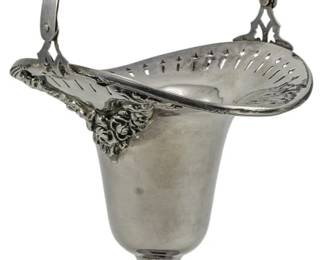 161 - Vintage Silver Plate Basket 9.5"x5" (Description): Vintage silver plate basket featuring an  elegant pedestal base with stepped rings, a  bell-shaped body, and a flared pierced rim  adorned with floral applique details. The  arched swing handle is decorated with ornamental openwork. Measures 9 1/2" x 5"