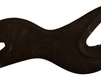 4033 - Vintage Cast Iron Alligator Wrench (Description): Vintage alligator wrench featuring a  distinctive S-shaped double-ended design with  serrated jaws on each end. This cast iron  multi-purpose tool displays a dark patina  consistent with age and use, with a textured grip surface in the center section. Alligator  wrenches were commonly used for gripping and  turning pipes, nuts, and other fasteners of  various sizes.