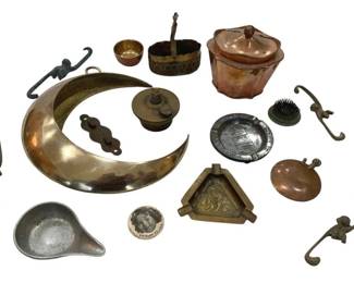1208 - Vtg Antique Decorative Metal Items (Description): A collection of vintage and antique metal  items including brass coat hooks with figural  monkey designs, a triangular engraved brass  ashtray, a copper egg-shaped vessel, a  crescent-shaped brass horn or bugle, a Shirley Temple pinback button, a small pewter  dish, an aluminum ashtray, a pink glass and  metal jewelry casket, decorative brass  fixtures, and various small metal accessories  and hardware pieces. The assortment features