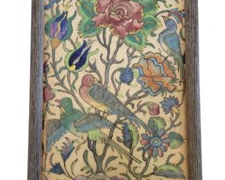 464 - Framed Persian Style Tile w/ Birds & Flowers (Description): Framed decorative tile featuring a  Persian-style design with colorful birds and  floral motifs. The hand-painted composition  includes roses, stylized flowers, and various  birds set against a cream background with flowing vines and foliage. The tile has a  visible crack and is presented in a weathered  gray wood frame. Measures 16.5" x 11".