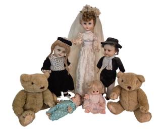 3808 - Collection of Vtg Dolls and Teddy Bears (Description): A charming collection of vintage dolls and  teddy bears. The grouping includes a bride  doll in a white lace wedding gown with veil  and floral headpiece, a girl doll with blonde  braids wearing a black velvet dress with white lace collar, a boy doll dressed in  black with white scarf and black hat, two  smaller baby dolls in pastel outfits, and a  pair of plush tan teddy bears. The dolls  feature various compositions including hard