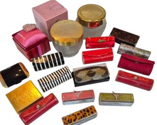 2713 - Group Make Up & Lipstick Cases (Description): A group of assorted make up and lipstick  cases in various styles, colors, and  materials. The collection includes multiple  decorative cases suitable for organizing and  carrying cosmetics.