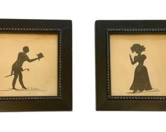 1168 - 2 Art Deco Silhouettes Signed by E.C. (Description): A pair of framed artworks signed by E.C. The  pieces feature silhouette-style imagery  presented in matching dark frames with  decorative beaded inner borders. Each  measures 6 1/2 inches by 6 1/2 inches.