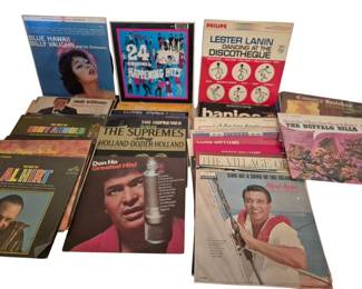 3907 - Collection of Vintage Vinyl LP Records (Description): A group of vintage vinyl LP records featuring  a variety of artists and genres. The  collection includes albums from notable  performers such as Billy Vaughn and his  Orchestra (Blue Hawaii), The Supremes (Sing Holland-Dozier-Holland), Andy Williams, Al  Hirt, Don Ho Greatest Hits, Lester Lanin  Dancing at the Discotheque, Eddy Arnold, Stan  Getz, Roger Williams, The Buffalo Bills,  Alfred Apaka, and various compilation albums.
