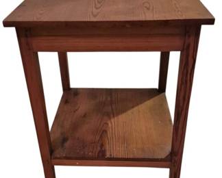 3749 - Square Oak Pegged Table 27"x20"x20" (Description): Square oak pegged table featuring a simple,  classic design with tapered legs and a lower  shelf. The table showcases beautiful natural  wood grain throughout and displays  traditional peg construction details. The warm, medium-toned oak finish complements the  straightforward craftsmanship.
