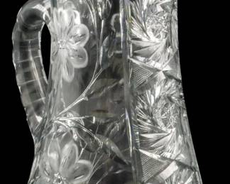 139 - American Brilliant Cut Glass Pitcher Vase (Description): American Brilliant cut glass pitcher vase  featuring intricate cut patterns. Measures  10.5" in height.
