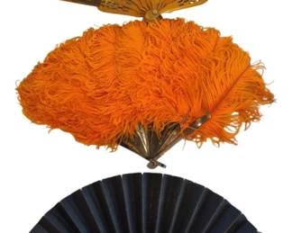1448 - 3 Victorian Fans, Longest 8" Closed (Description): The group includes a brown fabric fan with  ornate pierced gilt sticks, a vibrant orange  ostrich feather fan with metal handle, and a  navy blue fabric fan with dark wooden sticks.