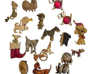 1478 - Vtg Dog Figural Pin Collection Poodles (Description): A charming collection of vintage dog-themed  figural pins and brooches. The assortment  features various breeds including poodles, a  dachshund, schnauzers, a Pekingese, and other  whimsical canine designs. The pieces showcase diverse styles and finishes  including gold-tone, silver-tone, and enamel  work. Several pins feature decorative  elements such as rhinestone eyes, red enamel  accents, and cabochon details. Notable pieces