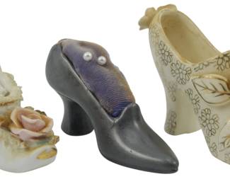 887 - 3 Porcelain Shoes, Varying Makers 2.5" (Description): A collection of three porcelain decorative  shoes from varying makers. Each shoe measures  2.5 inches.