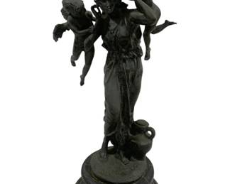 8002 - Bronze Statue Woman w/ Two Cherubs 26"x10" (Description): Bronze statue depicting a classical draped  woman with two winged cherubs or putti, one  perched at each shoulder. The female figure  stands in flowing Grecian-style robes beside  a small amphora vessel. The sculpture is mounted on a turned black marblebase with  natural veining. The bronze has a dark patina  with subtle verdigris accents. Measures 26  inches tall by 10 inches wide.