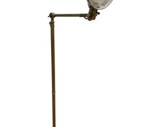 1421 - Adjustable Brass Reading Lamp 46.5" Tall (Description): Brass reading lamp featuring an adjustable  swing arm design with articulating joints.  The lamp stands on a circular stepped base. Used as is electric/electronic/mechanical  item. No guarantee all components, untested.