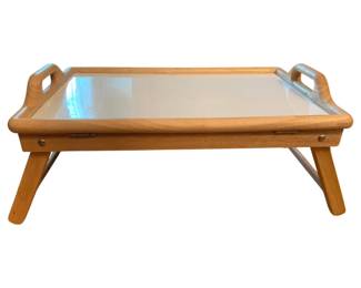 2122 - TV Tray 10.5"x22"x14" (Description): Wooden TV tray with folding legs and cut-out  handles. Features a white laminate surface.  Measures 10.5" x 22" x 14".
