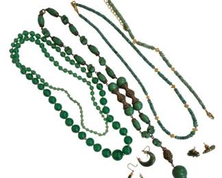 2705 - Group Jade & Jade Color Necklaces & Earrings (Description): A collection of jade and jade color jewelry  including multiple beaded necklaces in  varying styles and sizes, along with  coordinating earrings. The group features  graduated bead necklaces, wire-wrapped beaded designs, and delicate strand necklaces.  Accompanying earrings include drop and hoop  styles. A lovely assortment of green-toned  jewelry pieces.