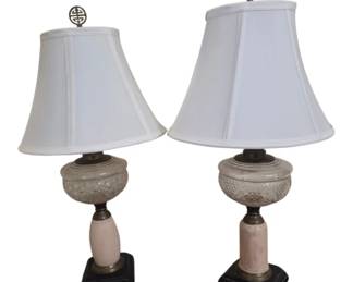 1261 - Pr Vintage Marble & Glass Table Lamps 24"x22" (Description): Pair of vintage table lamps featuring cut  glass urn-form bodies with marble columns on  black stepped bases. Each lamp is topped with  a white fabric bell shade and decorative  Asian-style brass finial. The lamps measure 24 inches tall. Used as is electric/electronic/mechanical  item. No guarantee all components, untested.