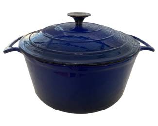 671 - Blue Enamel Cast Iron Dutch Oven w/ Lid (Description): Cast iron Dutch oven features side handles  for easy lifting and a fitted lid with knob  handle mady by Cook's Tools