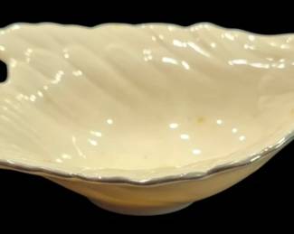 2817 - Lenox Bird Dish 3"x8"x5" (Description): Lenox bird dish featuring a decorative bird  design. The piece showcases Lenox's classic  cream-colored porcelain craftsmanship.  Measures 3" x 8" x 5".
