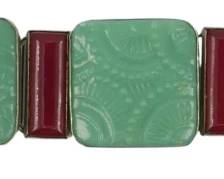 1901 - Pressed Glass Panel Bracelet Made in France (Description): Pressed glass panel bracelet made in France.  The bracelet features decorative pressed  glass panels with a clasp closure.