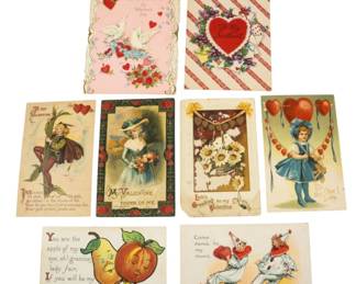 849 - Valentines Day Postcards (Description): Assorted Valentines Day postcards featuring  various romantic and whimsical designs. The  collection includes cards with traditional  Valentine motifs such as hearts, doves,  flowers, and charming illustrations of children and anthropomorphic characters.  Cards display various Valentine greetings and  sentiments.