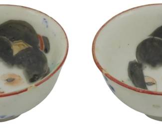 1721 - 2 Vintage Porcelain Sake Cups 1" (Description): Two vintage porcelain sake cups featuring  hand-painted decoration. Each cup measures 1  inch.