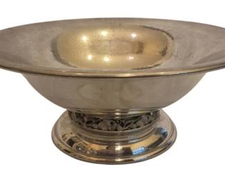 553 - Anheuser-Busch Handmade Bowl (Description): Large handmade pewter bowl created by Shirley  of Williamsburg, Virginia. Bottom says  "Created Expressly For The Friends of  Anheuser-Busch. A limited edition." 14"  diameter, 5 1/2" tall. The pedestal has a cut out design.