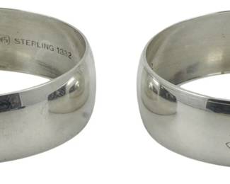 98 - 2 Gorham Sterling Napkin Holders 0.77oz (Description): Two Gorham sterling silver napkin holders.  One is engraved with the name "Ruth" and the  other with "Goode." Total weight is 0.77oz.