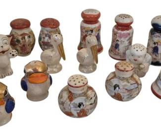 3998 - Collection of Ceramic Salt & Pepper Shakers (Description): Collection of salt and pepper shakers  featuring a variety of vintage ceramic  designs. The assortment includes Japanese  Satsuma-style shakers with hand-painted  geisha and landscape scenes, figural shakers depicting cats and human busts, and other  decorative pieces with gold accents and  colorful glazes. Various sizes and styles  represented in this charming grouping of  novelty and traditional tableware.