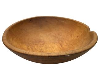 911 - Vintage Wooden Dough Bowl 15"x5" (Description): Bowl features a characteristic notched handle  on one side, a traditional design element of  hand-turned dough bowls. The piece displays  the gentle wear consistent with vintage use.  Measures 15 inches in diameter by 5 inches in height.