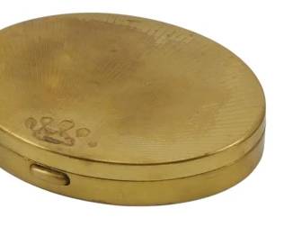 1769 - 3 Vintage Compacts (Description): A collection of three vintage compacts. The  grouping includes varied styles and designs,  showcasing the decorative craftsmanship  typical of vintage powder compacts.