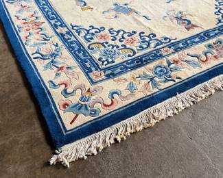 This lot features a hand made 100% wool rug from the People’s Republic of China in a cream color. Measures, 138” H x 99” W.